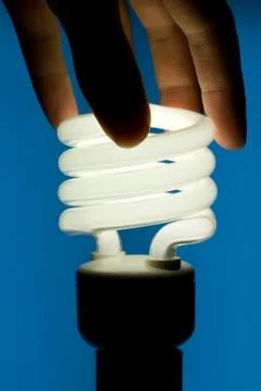 Hand Installing Fluorescent Bulb Stock Photos