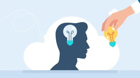 Hand installing light bulb on human head. Man changes lightbulb. Business idea Stock Footage 259513606