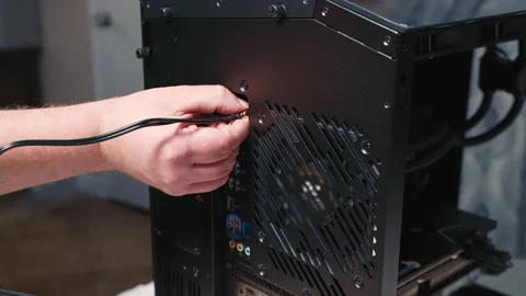 Hand installing wireless antenna connectors on desktop computer Stock Footage 328981729