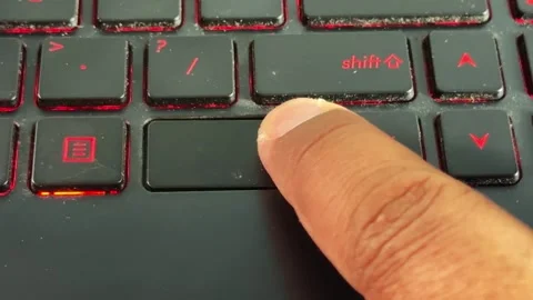 Hand interacting with "ctrl" button laptop keyboard, Stock Footage 334635693