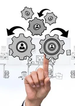 Hand interacting with people in cogs graphics against office background Stock Photos