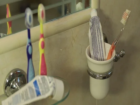 Hand it is putting in place just the old toothbrush to brush Stock Footage 74238960