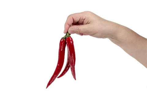 Hand keeps the cut red pepper Stock Photos