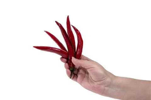 Hand keeps the cut red pepper Stock Photos