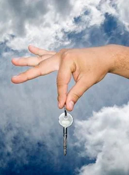 Hand with key Stock Photos