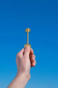 Hand with key Stock Photos
