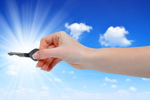 Hand with key Stock Photos