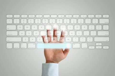 Hand on keyboard Stockfoto's