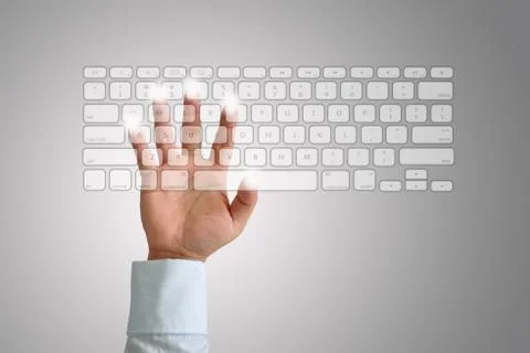 Hand on keyboard Stock Photos