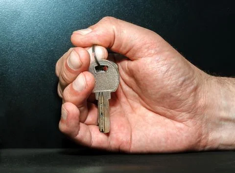 Hand with keys Stock Photos