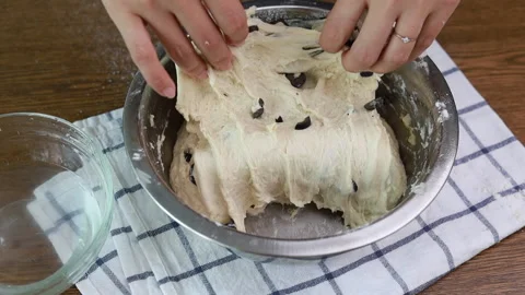 Hand kneading dough, process of making ciabatta olive bread Stock Footage 160156784