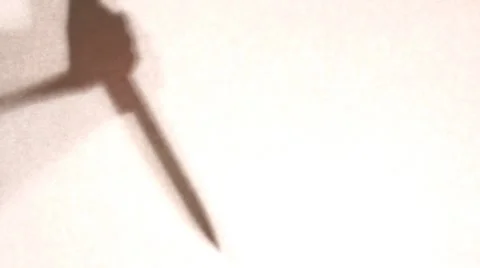 Hand with knife Stock Footage 8602589