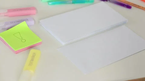 Hand labeling envelope with sticky note on white table Stock Footage 331508428