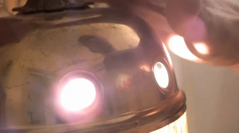 Hand on the lamp 스톡 동영상 37783531