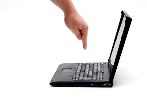 Hand on laptop Stock Photos