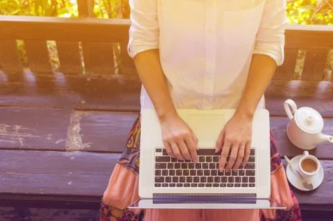 Hand on laptop. Stock Photos