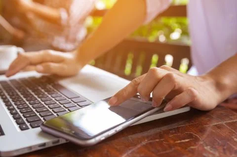 Hand on laptop. Stock Photos