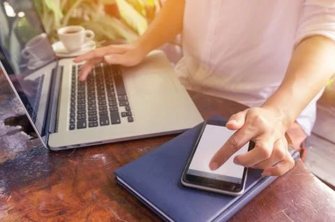 Hand on laptop. Stock Photos