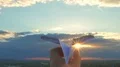 The hand launch paper airplane on stormy sunset background. slow motion capture 4k or 4k+ Resolution