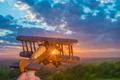 The hand launch toy plane on the background of a sunrise Photo