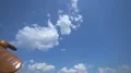 The hand launch the wooden plane on the background of a blue sky 4k or 4k+ Resolution