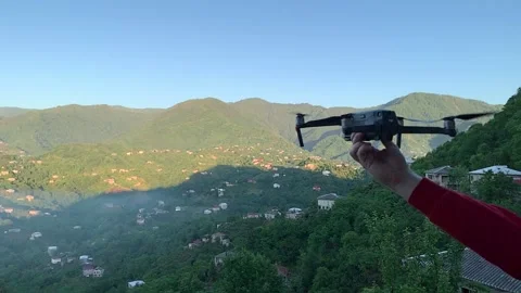 Hand launching the drone Stock Footage 161867998