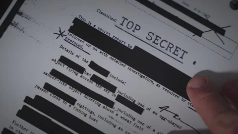 Hand laying down top secret document on scanner tray to copy or scan to Stock Footage 317548125