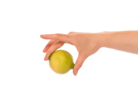Hand with lemon Stock Photos