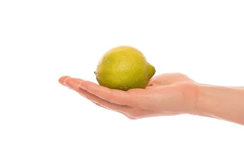 Hand with lemon Stock Photos