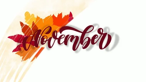 Hand lettering November script. Autumn leaves at the background are revealed Stock Footage 118519999