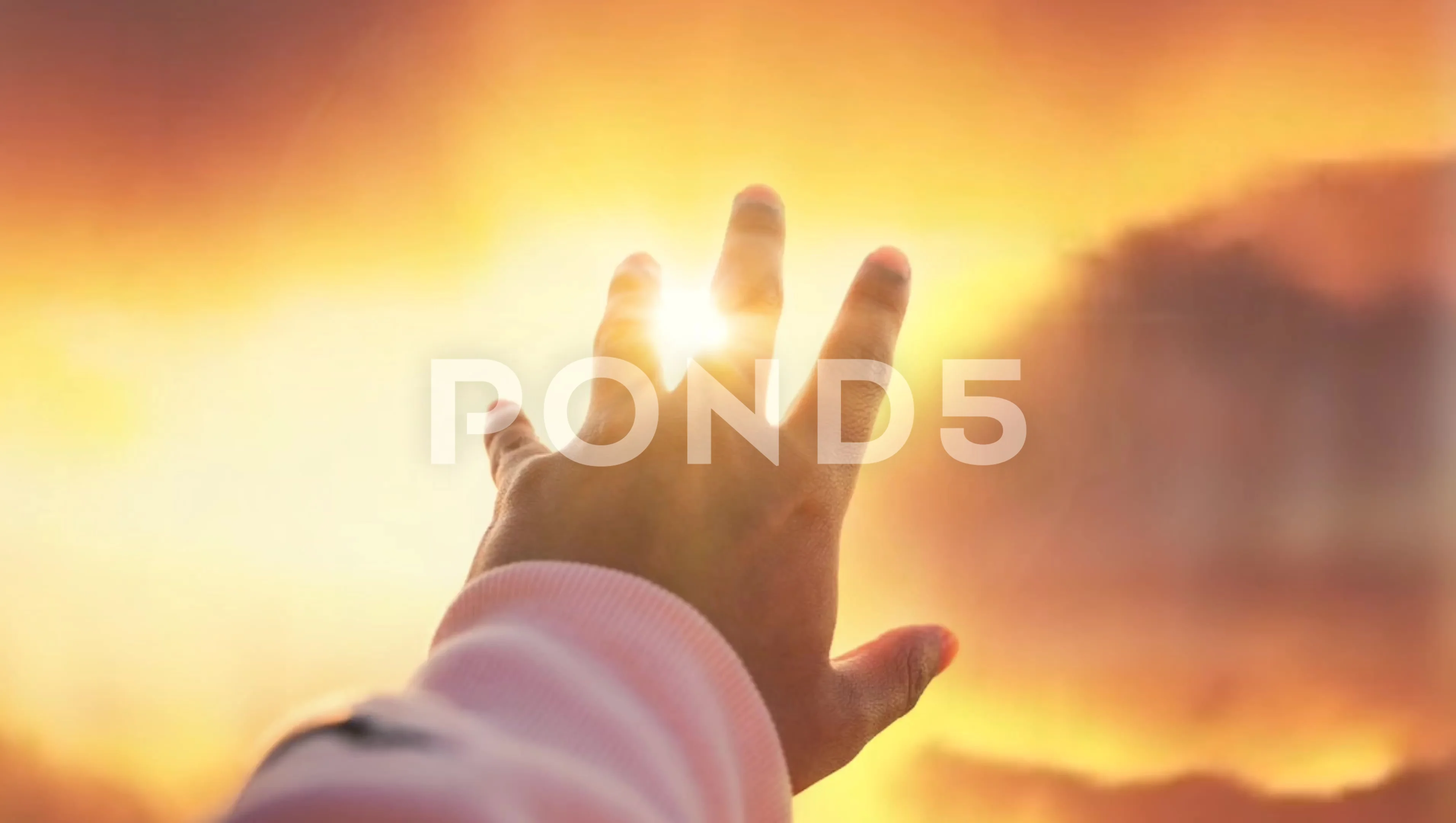 Hand lifted in prayer to the sky in prai... | Stock Video | Pond5