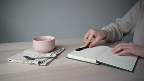 Hand lifting coffee cup at desk Video stock 328003230