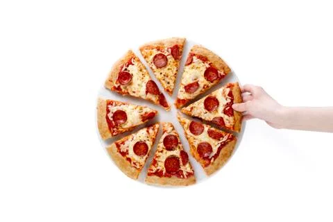Hand lifting a slice of pepperoni pizza Stock Photos