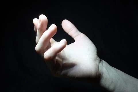 Hand in the light Foto stock