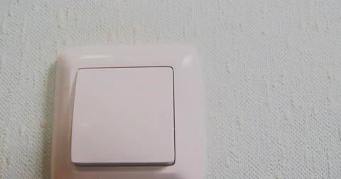 Hand light switch close up 4k video Stock Footage 143124818