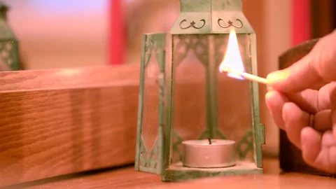 Hand lightening a candle 스톡 동영상 133714369