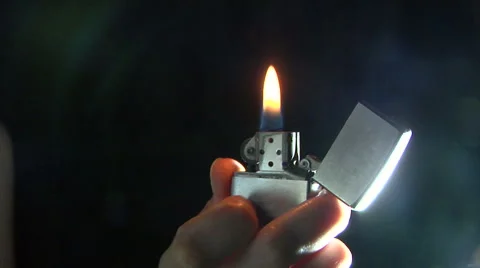 Hand with lighter igniting sparks Stock Footage 51866886