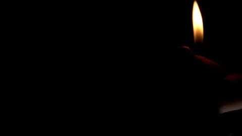 A hand with a lighter sets fire to the sticks. Stock Footage 121747710
