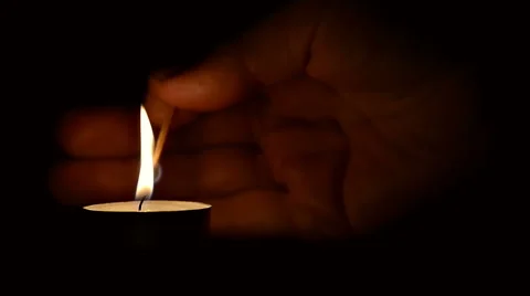 Hand Lighting Candle in Dark Stock-Footage 48270378