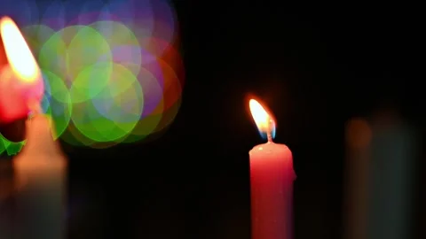 Hand Lighting Candles Flame At Night in Colombian Christmas Celebration. 動画素材 339743576
