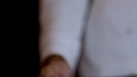 Hand lighting a cigarette lighter, slow motion. Stock Footage 120945757