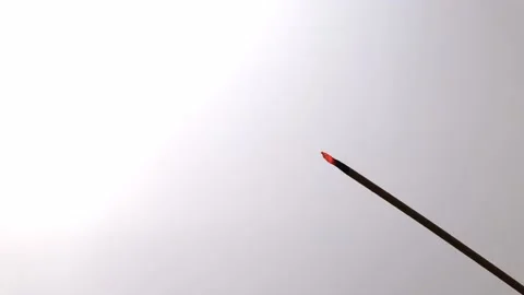 Hand lighting the end of the incense stick with a match and gently extinguishing Stock Footage 218358297
