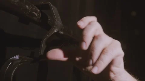 The hand of the lighting worker removes the profile spotlight from the inst.. Stock Footage 309729878