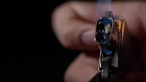 Hand lighting a Zippo lighter in slow motion. Close up Stock Footage 321866191