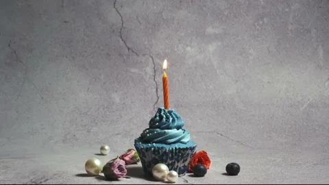 Hand lights a candle on the cake Stock Footage 223671211