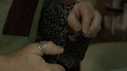 Hand lights a candle in the hand Stock Footage 123005577