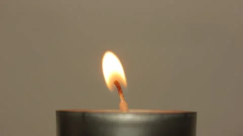 Hand Lights Small Candle With Match It Burns And Is Blown Out Stock Footage 151579398