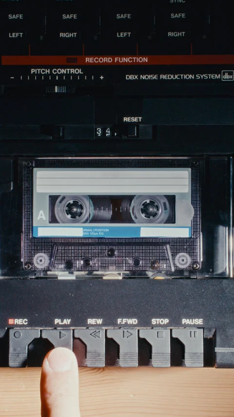Hand Loading Cassette Tape and Turning On Retro Multitrack Recorder Vidéo 342451561