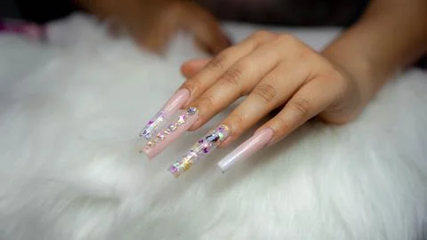 Hand with long nails Stock Photos
