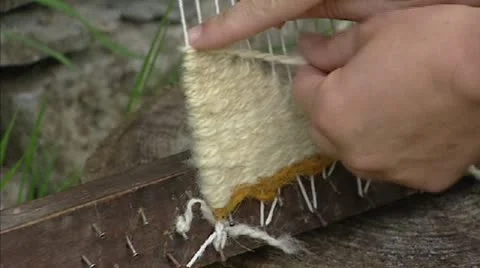 Hand loom + close up hand + thread Stock Footage 21271010